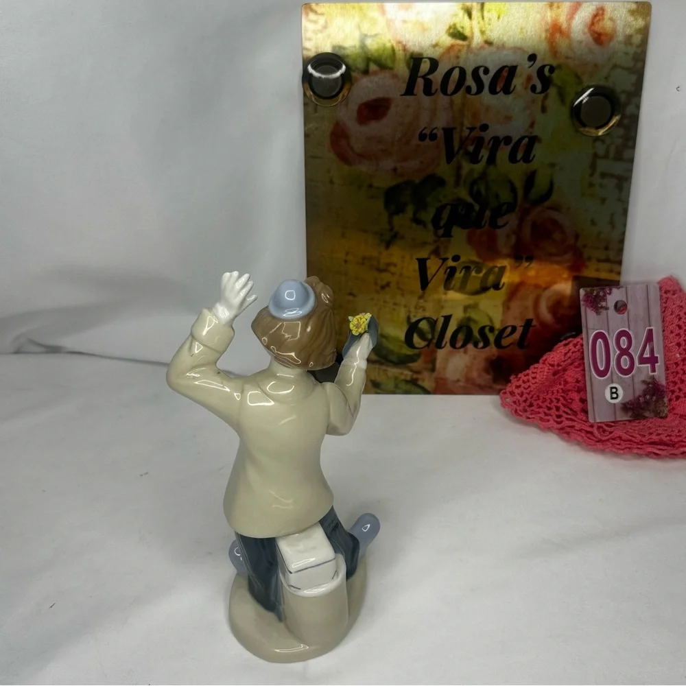 Vintage Paul Sabastian Porcelain Clown Figurine with Flower
